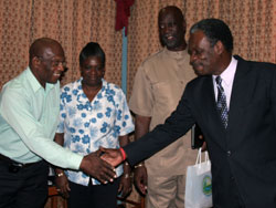 THA Chief Secretary Orville London (right) welcomes Cipriani College of Labour and Cooperative Studies Tobago Director George Bobb to a meeting at his Calder Hall Office. Looking on are Secretary Petal Dawn Hinkinson and College Chairman Joseph Remy.