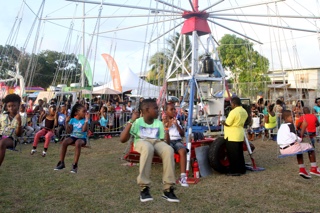 Children had lots to enjoy at the Carnbee/Mt Pleasant Sports Festival, including wall climbing and amusement park rides.