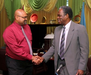 T&TEC Manager of Tobago Operations Ganesh Narine and THA Chief Secretary Orville London.