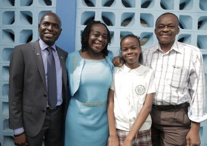 Secretary of Education, Youth Affairs and Sport Huey Cadette, left, stands with Debra Amata, second from right, and her family, mom Dr. Vivienne Amata, and dad Andrew Amata, right. 