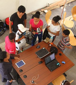 Students get an up close view of the underwater camera during the interactive workshop.