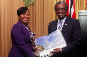 Chief Secretary Orville London and Minister of Tourism Shamfa Cudjoe, MP, exchange gifts during their meeting on Monday. Photos courtesy THA