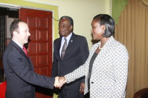 British High Commissioner Tim Stew, left, is greeted by THA Chief Secretary Orville London and Secretary of the Division of Tourism and Transportation, Tracy Davidson-Celestine. 